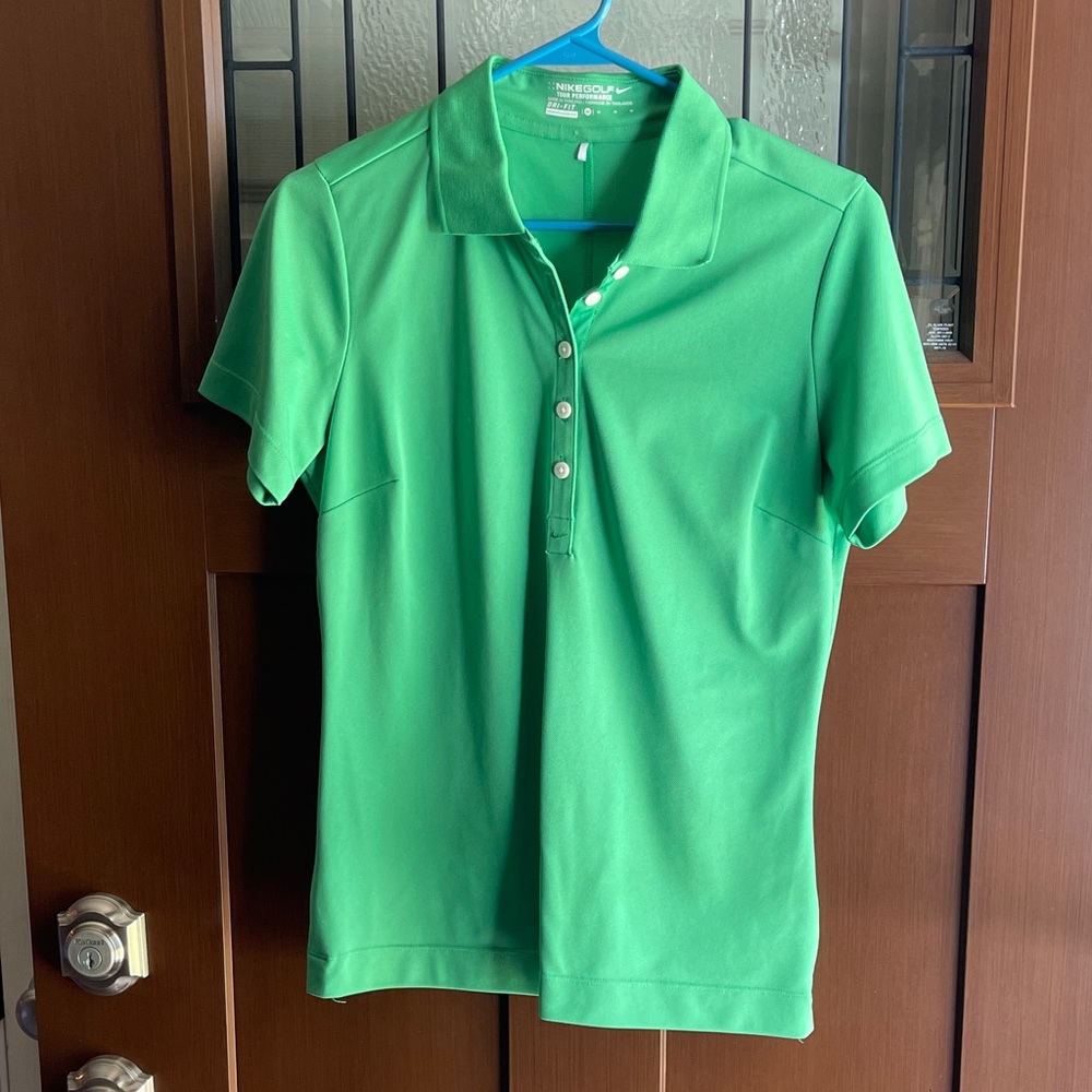 Nike women’s golf polo.  Size M Tour Performance dri-fit